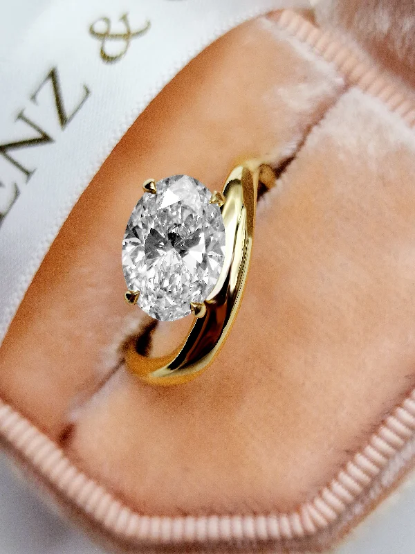 Ladies engagement rings round cut-2.02 Carat Lab Grown Oval Cut Wave Diamond Engagement Ring in Yellow Gold