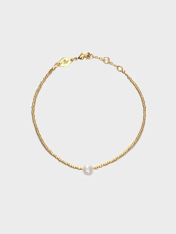 Ladies bracelets international brands-Pearly Bracelet in Brass with Gold Finish