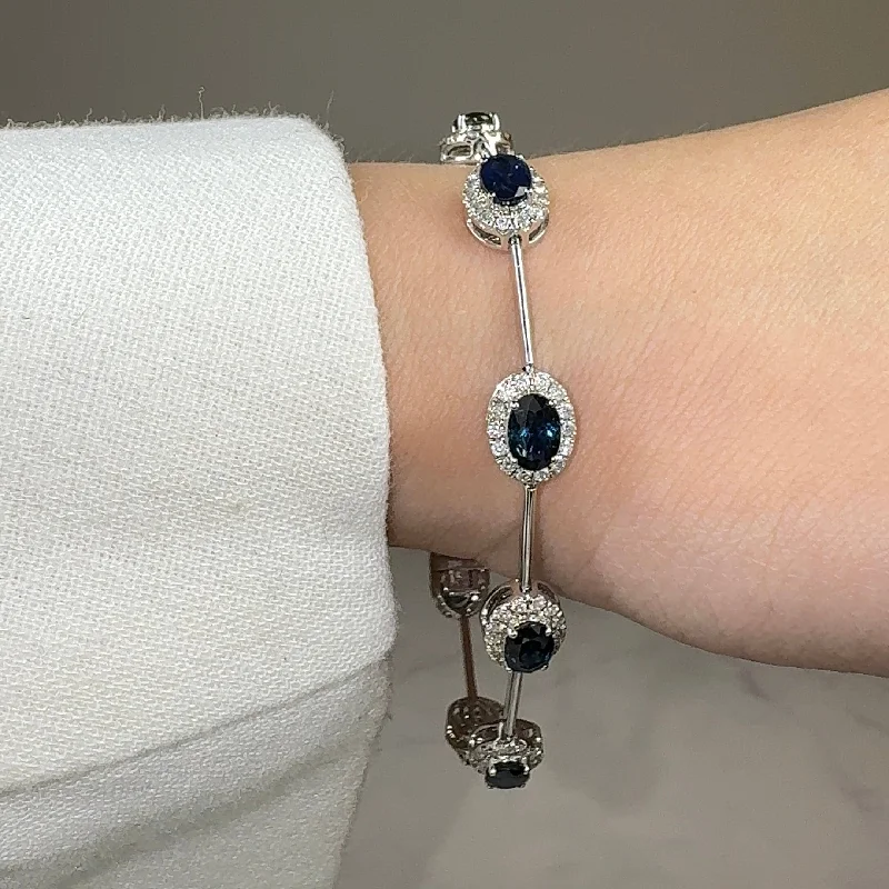 Ladies bracelets colorful gems-Oval Shape Sapphire Featuring Diamond Halo 18K White Gold Station Set Bracelet