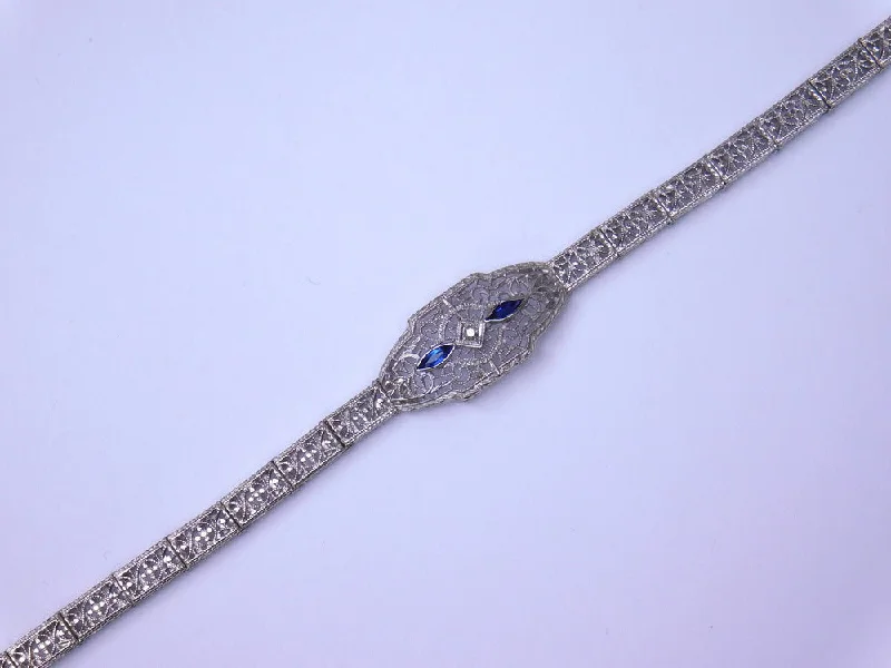 Ladies bracelets collectible items-14K ART DECO BRACELET WITH DIAMOND AND BLUE GLASS