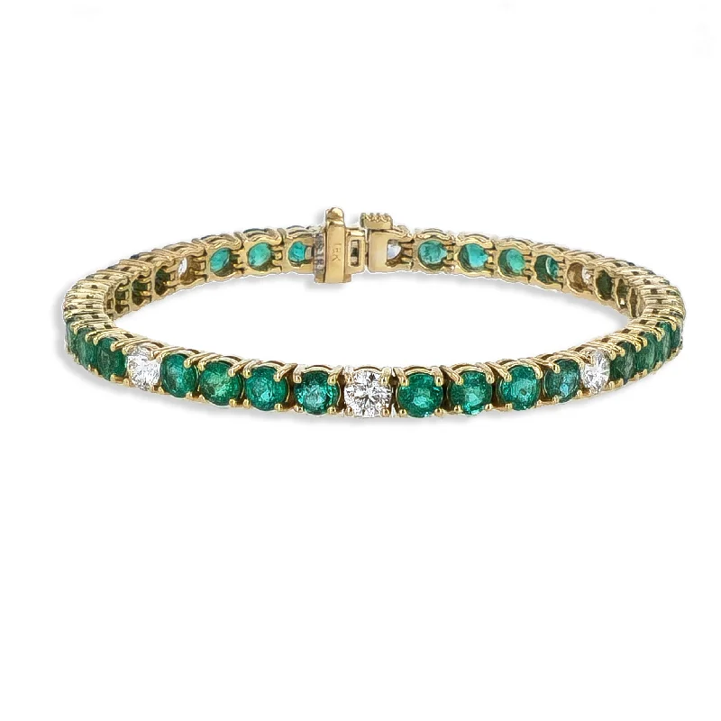 Ladies bracelets gothic appeal-Emerald and Diamond Yellow Gold Tennis Bracelet