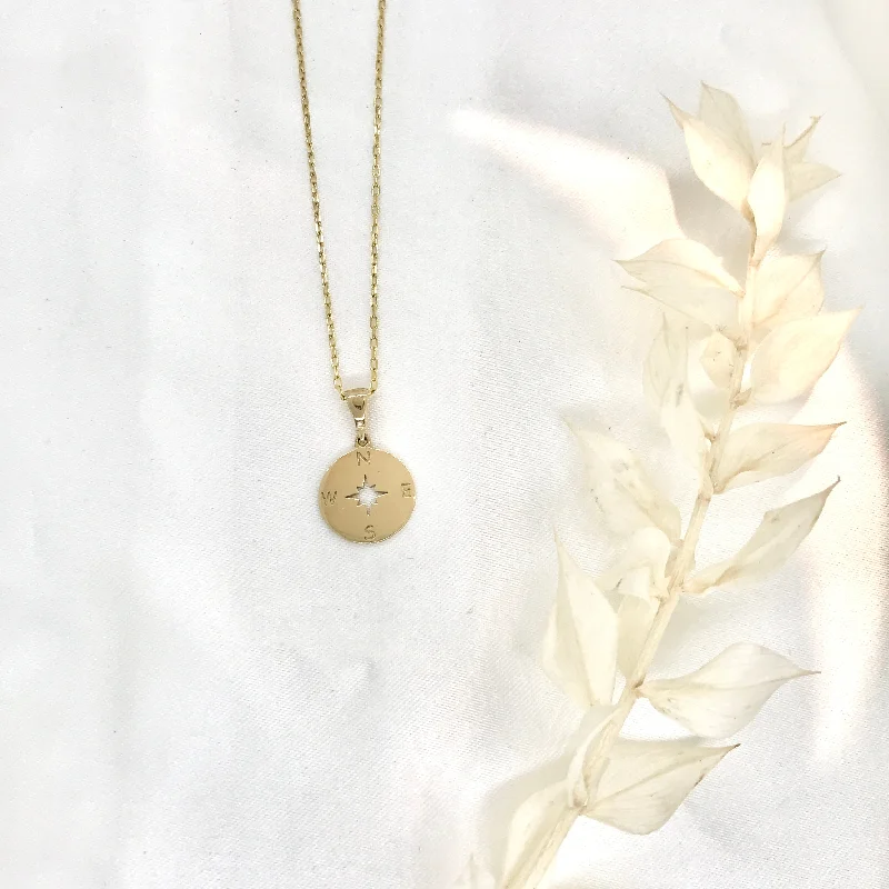 Ladies necklaces collectible items-10k Yellow Gold Compass Necklace