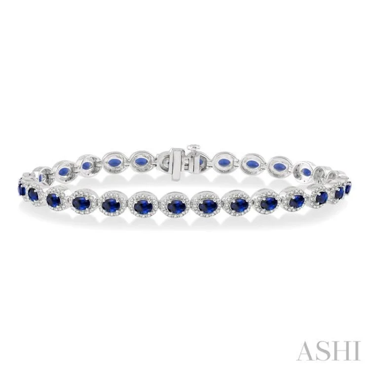 Ladies bracelets bangle style-1 Ctw Round Cut Diamond & 4x3MM Oval Cut Sapphire Precious Bracelet in 14K White Gold