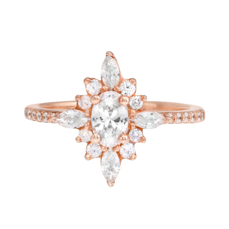 Ladies engagement rings best brands-Oval Diamond and Starburst Flower Halo Engagement Ring