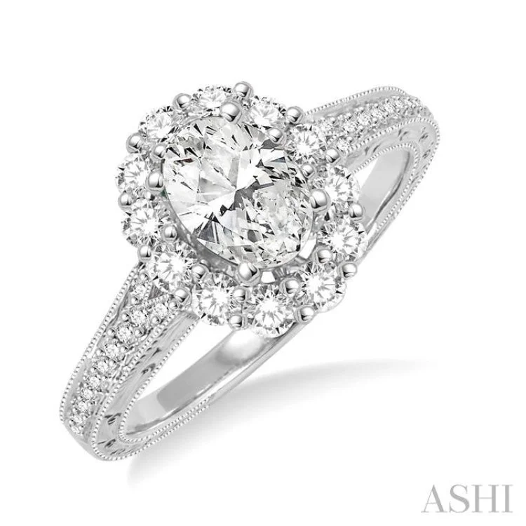 Ladies engagement rings round cut-1 1/6 Ctw Diamond Engagement Ring with 5/8 Ct Oval Cut Center Stone in 14K White Gold