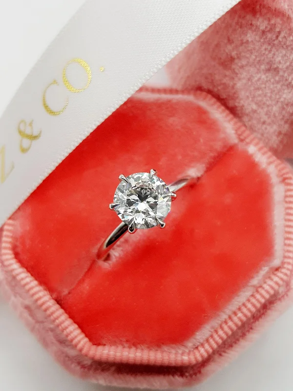 Ladies engagement rings price range-1.50 Carat Round Brilliant Cut Six Prongs Diamond Engagement Ring