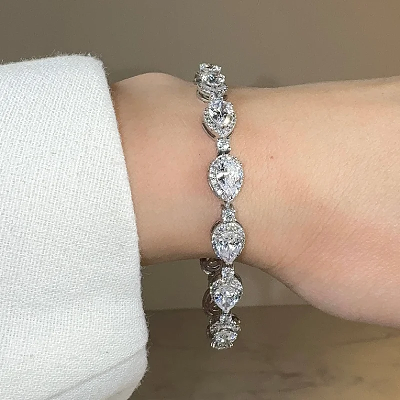 Ladies bracelets investment value-Pear Shape Halo 9 Carat Diamond Bracelet BRHAPS