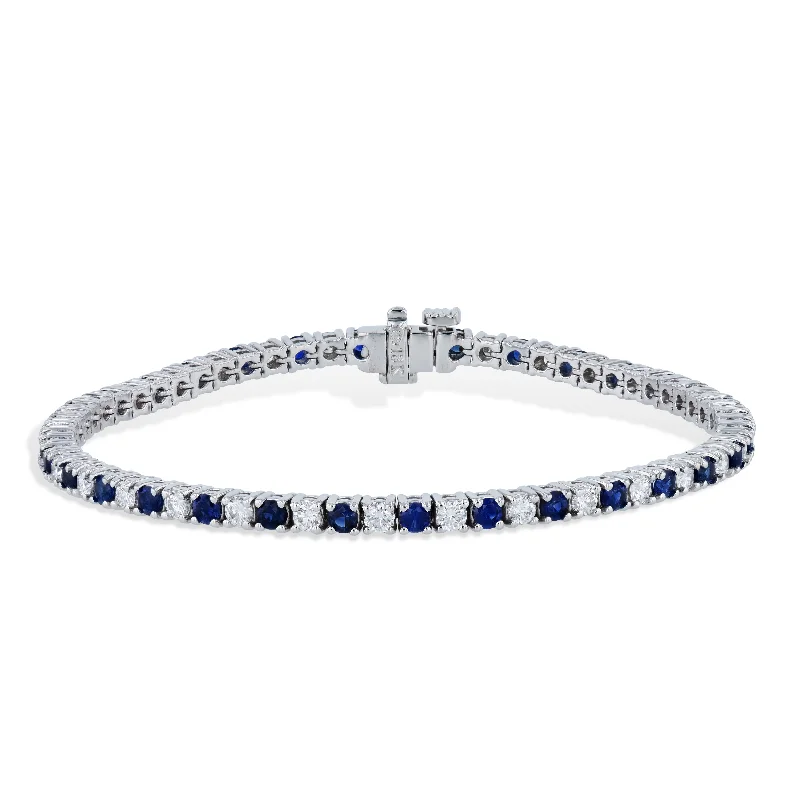 Ladies bracelets openwork patterns-Royal Blue Sapphire and Diamond White Gold Tennis Bracelet