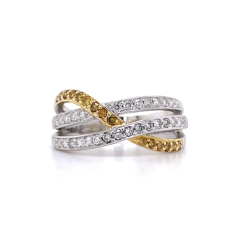 Ladies ring emotional symbol-Estate Fancy Yellow and White Diamond Twist Ring in Two-Tone Gold by Simon G