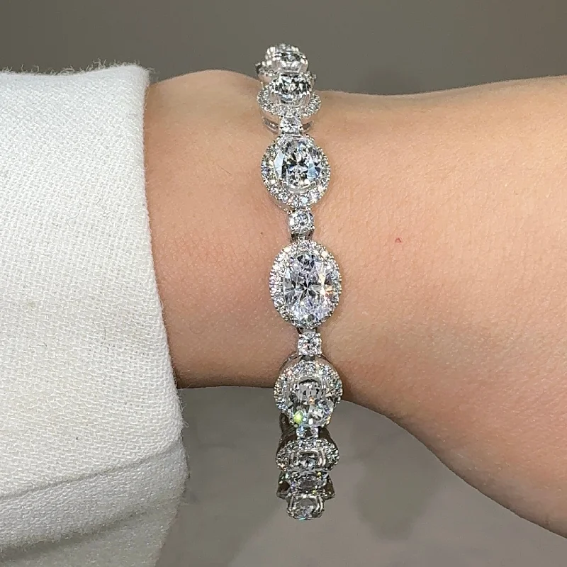 Ladies bracelets birthday gifts-Oval Shape Halo 9 Carat Diamond Bracelet BRHAOC