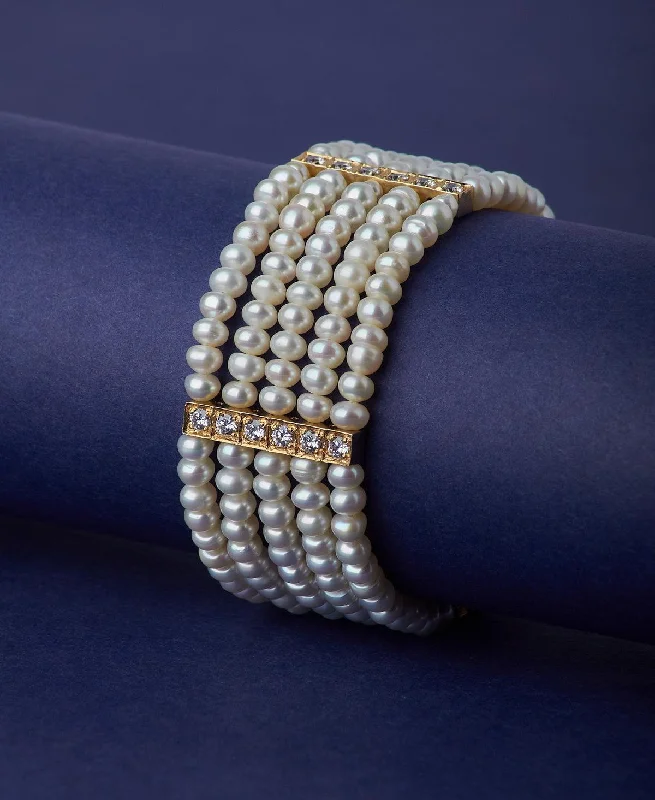 Ladies bracelets gold designs-Gorgeous Golden Pearl Bracelet