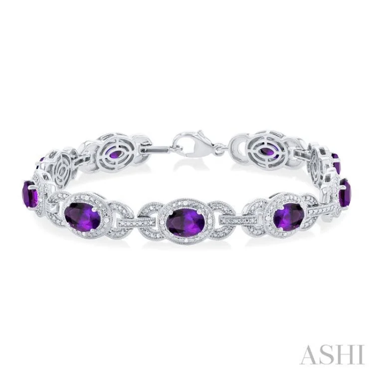 Ladies bracelets social media trends-1/10 ctw Oval Cut 7x5MM Amethyst and Round Cut Diamond Semi Precious Bracelet in Sterling Silver