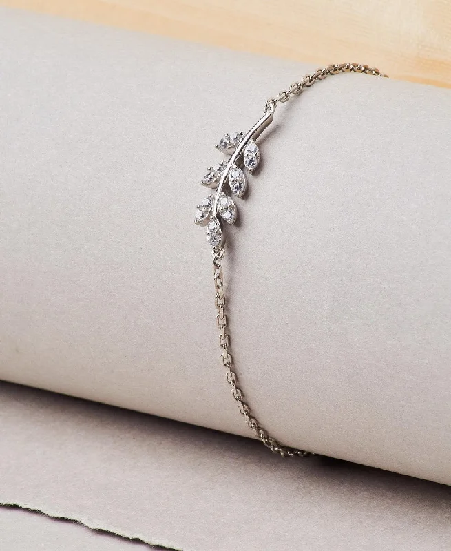 Ladies bracelets buying advice-Fashionable Leaf Stone Studded Silver Bracelet.